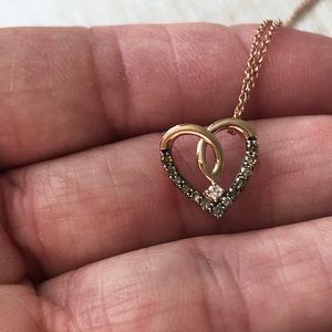 LeVian 14K rose gold hanging diamond heart necklace.